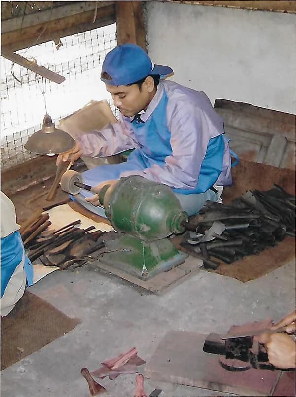 Pentacle India workshop interior showing woodworking equipment and workbenches